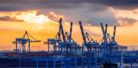 Haifa, Israel - November 6, 2022: Port of Haifa during dramatic sunrise. View from cruise ship.のeditorial素材