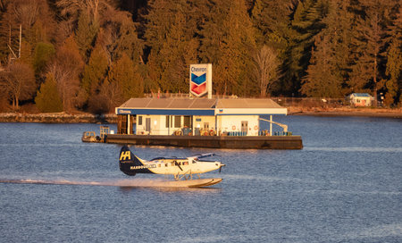 Vancouver, British Columbia, Canada - January 29, 2023: Harbour Air Float Airplane taking off from...
