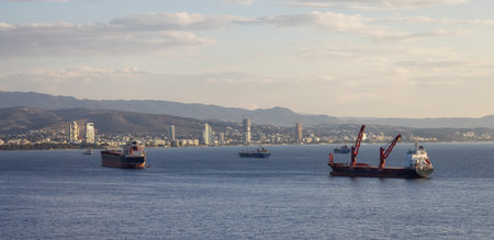 Ships at the Port and Modern Cityscape on the Sea Coast. Limassol, Cyprus. City Buildingsの写真素材