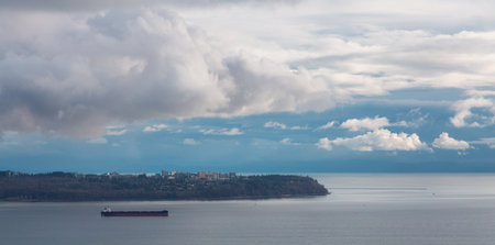 Colorful Cloudy Sky on the West Coast of Pacific Ocean. Cloudscape Nature Background. Vancouver, British Columbia, Canada.の写真素材