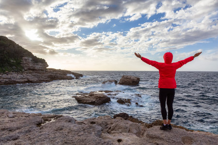 Woman on Rocky Coast in a park at Touristic Town, Sorrento, Italy. Amalfi Coast. Adventure Travelの写真素材