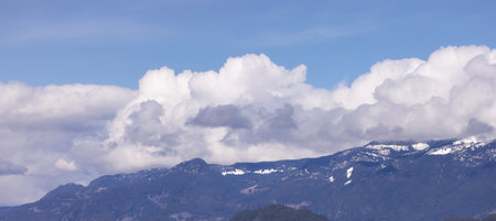 Puffy Clouds over Canadian Mountain Landscape, Sunny Day. Squamish, British Columbia, Canada. Nature Background.の写真素材