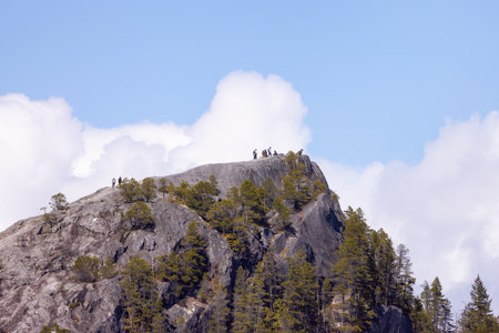 Rocky cliffs on Chief Mountain in Squamish, BC, Canada. Nature Background. Sunny day.の写真素材