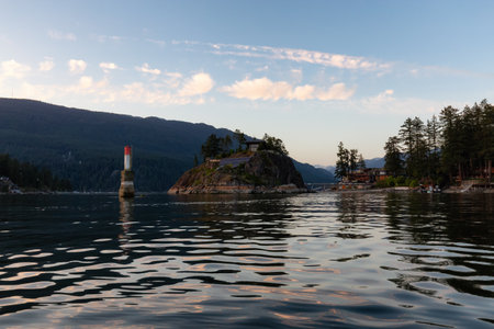 Residential Homes on the Water in Belcarra, Vancouver, BC, Canada. Sunny Sunset.の写真素材