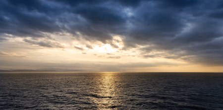 Cloudy Cloudscape during stormy everning on the West Coast of Pacific Ocean. British Columbia, Canada. Sunset Skyの写真素材