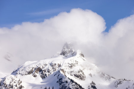 Sky Pilot Mountain covered in Snow. Canadian Landscape Nature Background. Squamish, British Columbia, Canada. Sunny Dayの写真素材