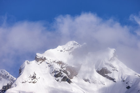 Sky Pilot Mountain covered in Snow. Canadian Landscape Nature Background. Squamish, British Columbia, Canada. Sunny Dayの写真素材