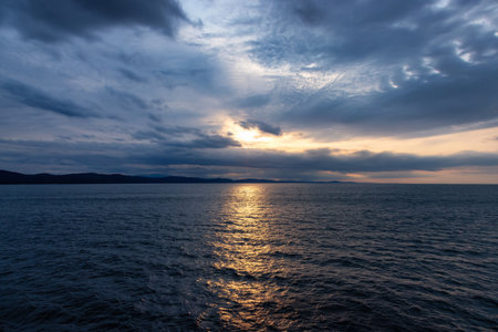 Cloudy Cloudscape during stormy everning on the West Coast of Pacific Ocean. British Columbia, Canada. Sunset Skyの写真素材