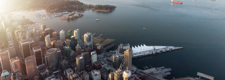 Downtown Vancouver, British Columbia, Canada. Modern City on West Coast of Pacific Ocean. Aerial View from Airplane.の写真素材