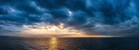 Cloudy Cloudscape during stormy everning on the West Coast of Pacific Ocean. British Columbia, Canada. Sunset Sky. Panoramaの写真素材