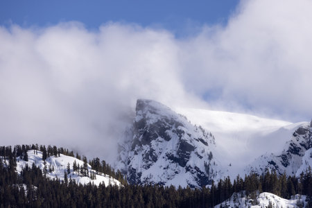 Sky Pilot Mountain covered in Snow. Canadian Landscape Nature Background. Squamish, British Columbia, Canada. Sunny Dayの写真素材