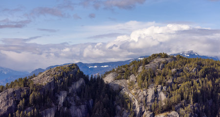 Rocky cliffs on Chief Mountain in Squamish, BC, Canada. Nature Background. Sunny day.の写真素材