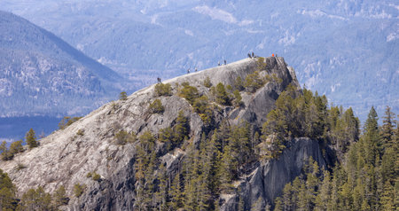 Rocky cliffs on Chief Mountain in Squamish, BC, Canada. Nature Background. Sunny day.の写真素材