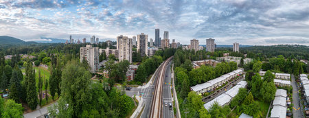 Residential Neighborhood and Apartment Buildings in Suburban City. Burnaby, Vancouver, BC, Canada. Aerial Panoramaの写真素材