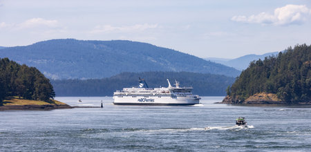 Gulf Islands, British Columbia, Canada - May 19, 2023: BC Ferries Passing By the islands on the West Coast of Pacific Ocean.のeditorial素材