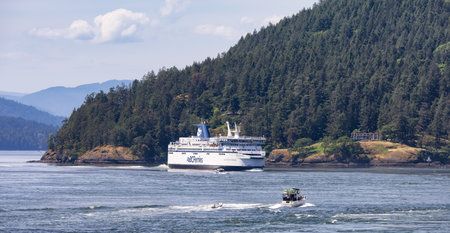 Gulf Islands, British Columbia, Canada - May 19, 2023: BC Ferries Passing By the islands on the West Coast of Pacific Ocean.のeditorial素材