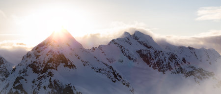 Canadian Coastal Mountain Landscape covered in Clouds. Aerial Panorama. British Columbia, Canada.の写真素材