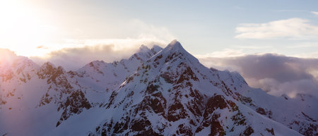 Canadian Coastal Mountain Landscape covered in Clouds. Aerial Panorama. British Columbia, Canada.の写真素材