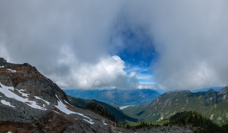 Aerial Panoramic View of Rocky Mountain Landscape. Cloudy Sunny Day. Taken in British Columbia, Canada. Nature Backgroundの写真素材