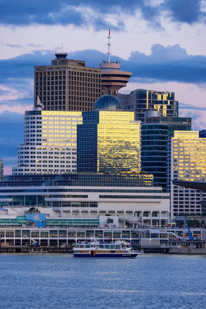 Downtown Vancouver, British Columbia, Canada - June 16, 2023: Modern City Skyline at Sunset. Canada Place.のeditorial素材