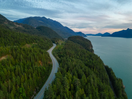 Scenic Highway on the ocean coast with mountain landscape. Sea to Sky Hwy, North of Vancouver, BC,...