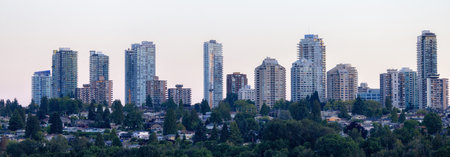 Panoramic View of Residential Apartment Home Buildings in Metrotown. Burnaby, Vancouver, BC, Canada. Sunny Sunsetの写真素材