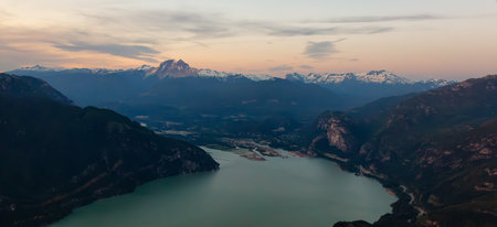 Canadian Mountain Landscape on the West Coast of Pacific Ocean. Aerial Nature Background. Sunset Sky. Howe Sound, British Columbia, Canada.の写真素材