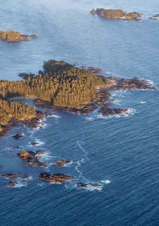 Beach on the Pacific Ocean Coast in Tofino, Vancouver Island, BC, Canada. Sunset. Aerial Nature Background Panoramaの写真素材