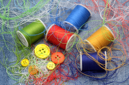 sewing kit on a blue jean templateの写真素材