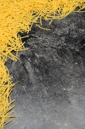 Noodles on black background close up photoの写真素材