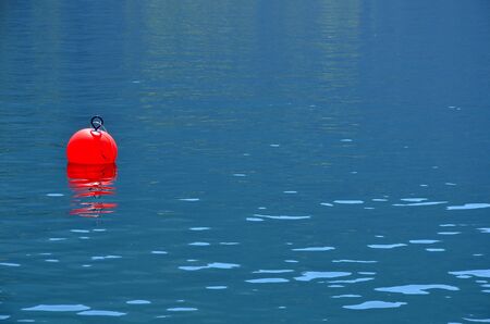 red Buoy for a boat on the left
