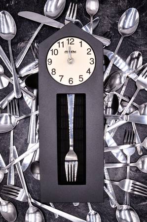 many cutlery spoon knife fork close up photoの写真素材