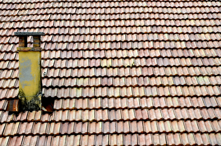 old roofing tiles and a roof close upの写真素材