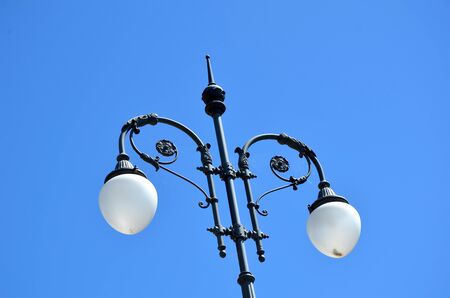street lantern behind is the blue skyの写真素材