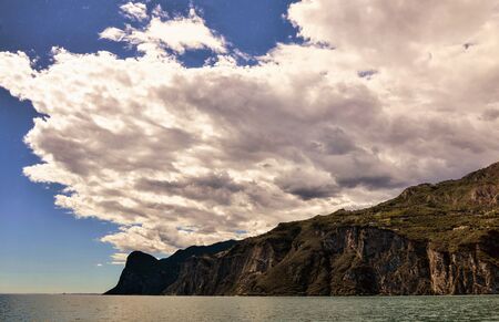 lake garda overview wiht clouds in the sky photoの写真素材