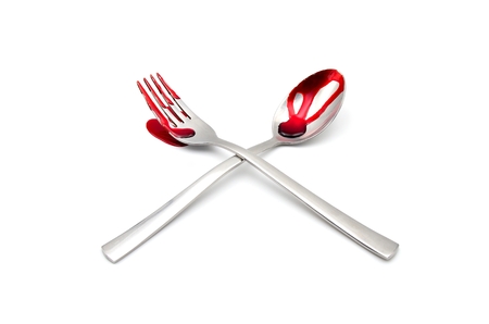 fork and spoon with blood on white backgroundの写真素材