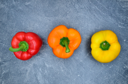 red orange yellow pepper close up photoの写真素材
