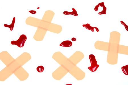 blood and plaster on a white backgroundの写真素材