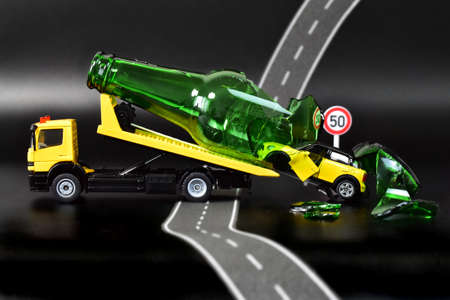 Truck with a bottle on the road. Accident conceptの写真素材