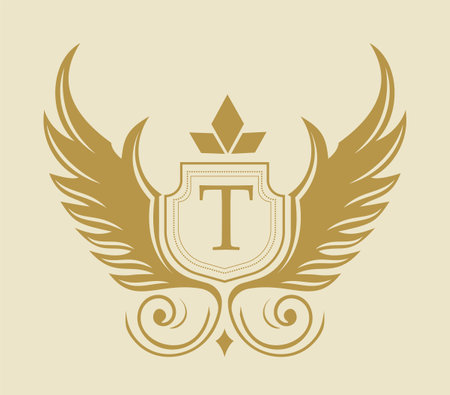 Golden heraldic emblem with a shield, the letter T, wings, and a crown-like design on a light background. Elegant and royal theme. Vector illustrationのイラスト素材
