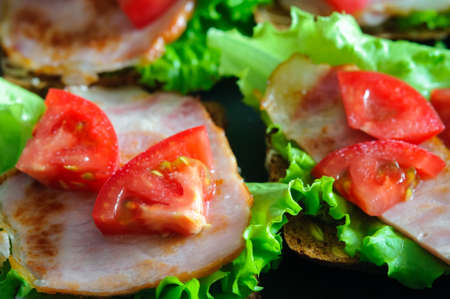 Sandwich, toastn with bacon, tomato and lettuce close-upの写真素材