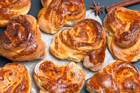 Homemade buns with cinnamon stick and anise star