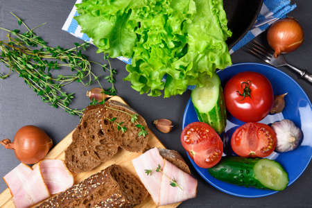 Top view: bread with bacon. Ingredients. Vegetablesの写真素材