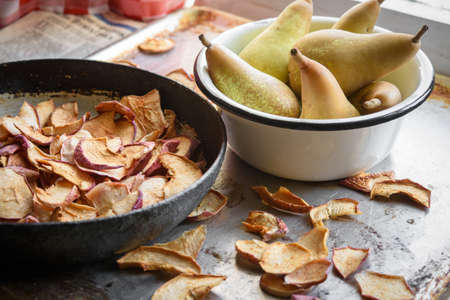 Dried apples and pears in bowls. Rustic vintage style. Countrysideの写真素材