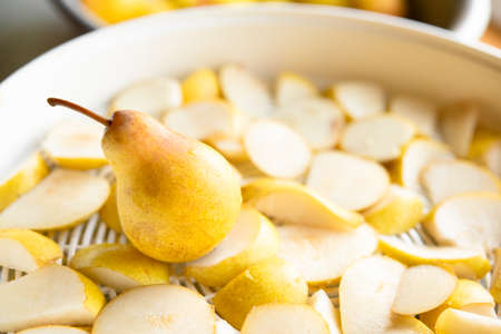 Homemade drying dehydration process of pears in slicesの写真素材