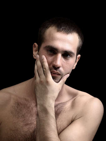 young man face expressions over black background