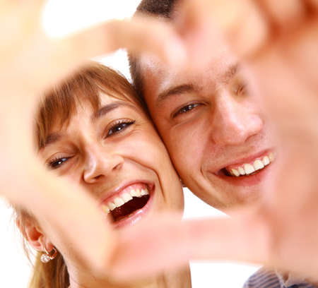 Happy smiling couple in love, over white background 