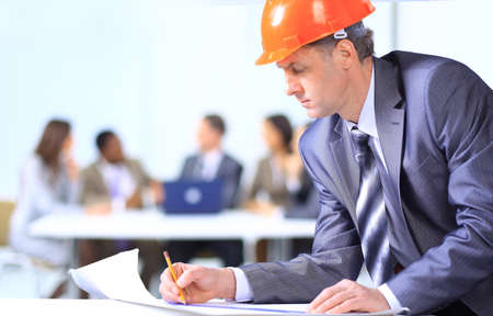 A handsome business construction man on the work site 