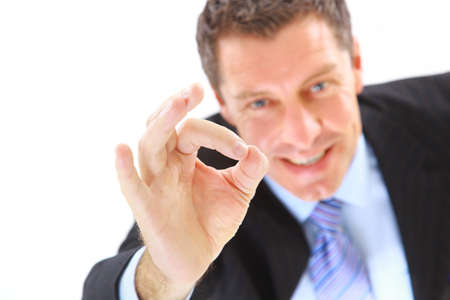 young business man going thumb up, isolated on white の写真素材