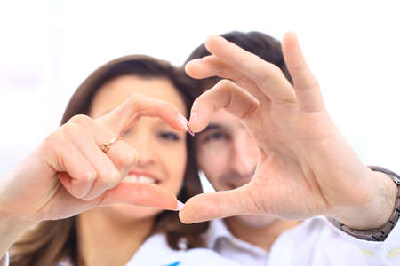 Happy smiling couple in love, over white background 